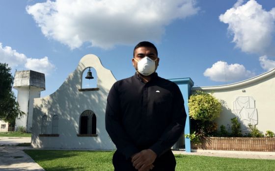 Fr. Humberto Zúñiga Rogríguez tends to a congregation hard hit by COVID-19 in the Mexican border city of Matamoros. He was tapped to serve as a chaplain in COVID-19 wards after becoming ill with the disease and eventually recovering. (David Agren)